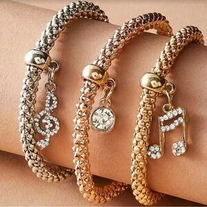New, Set of 3 multi metal, whimsical stretchy bracelets. Choose Owls or Music.